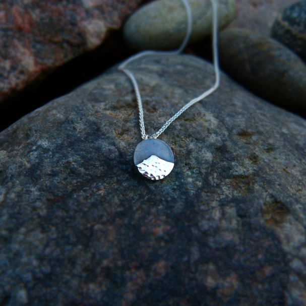 'Goatfell Pendant | Hammered, Polished, and Oxidised' by artist Jen Cunningham